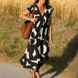 Maja – Elegantna lepršava haljina s V izrezom