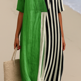 Eva – Elegantna Zelena Haljina s Crnim Prugama