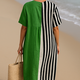 Eva – Elegantna Zelena Haljina s Crnim Prugama