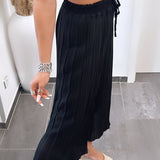 Ines – Elegantne crne plisirane hlače od svile