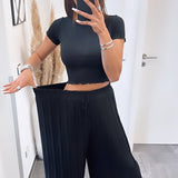 Ines – Elegantne crne plisirane hlače od svile