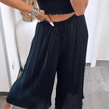 Ines – Elegantne crne plisirane hlače od svile