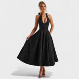 Nika – Elegantna midi haljina s teksturom od svile