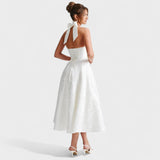 Nika – Elegantna midi haljina s teksturom od svile