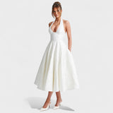 Katarina – Elegantan midi haljina s teksturom od svile